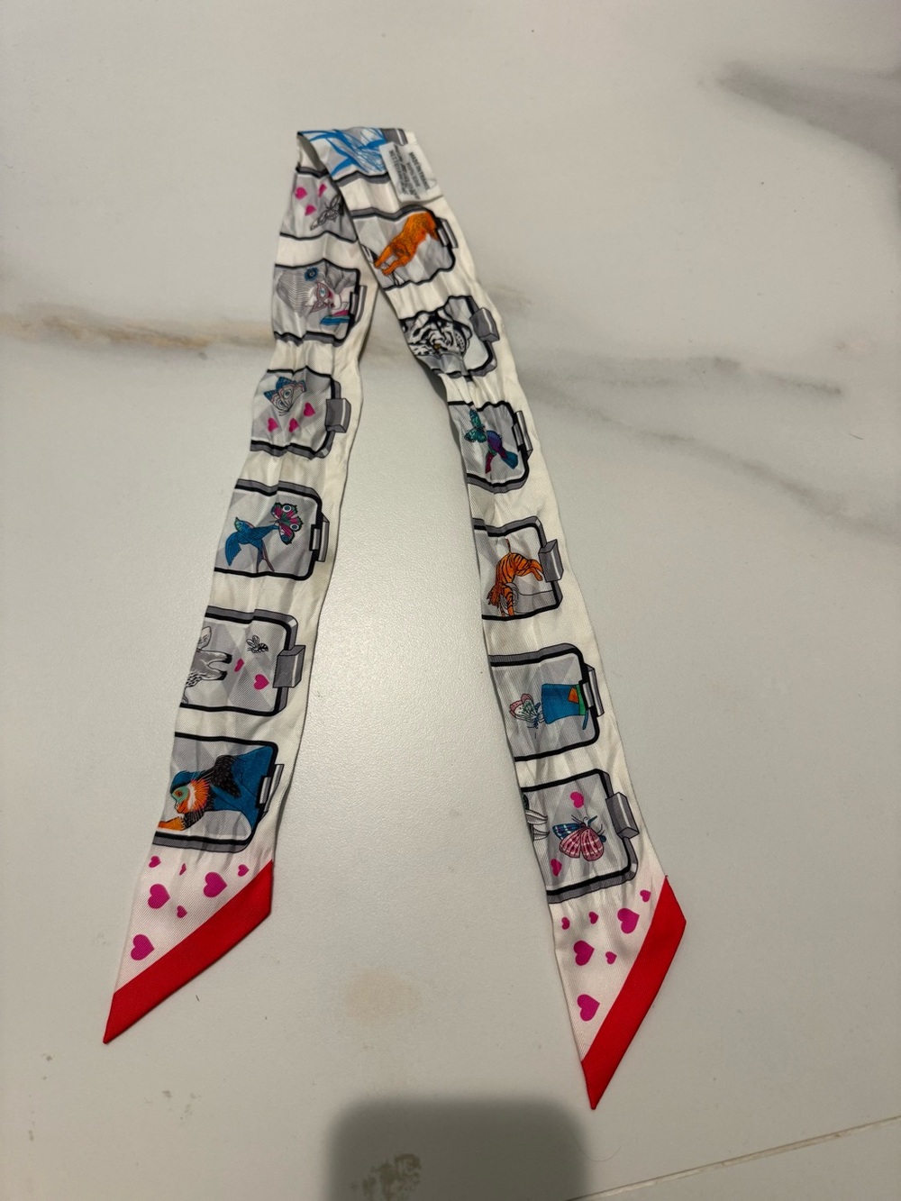 Hermes White Animal Print Twilly with Red Trim
